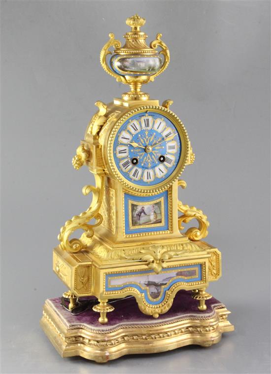 A mid 19th century French porcelain mounted ormolu mantel clock, Henry Marc, Paris, clock 38cm